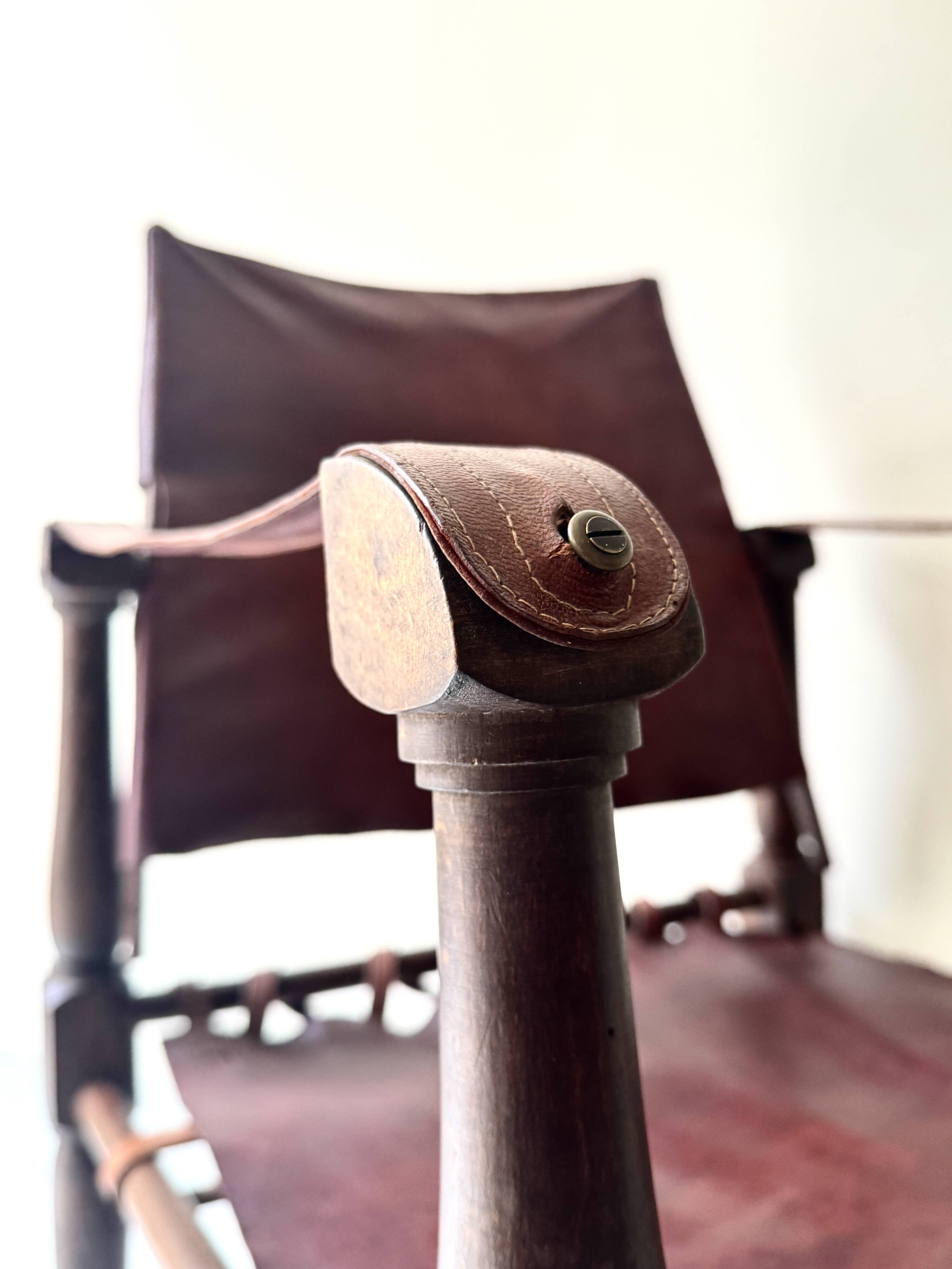 Scandinavian safari armchair in wood & burgundy leather upholstery 20th century