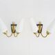 Pair of brass wall lights with double white tube lights. 70s