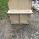 Small vintage yellow bench made of hand-painted wood, low storage from the 1920s.