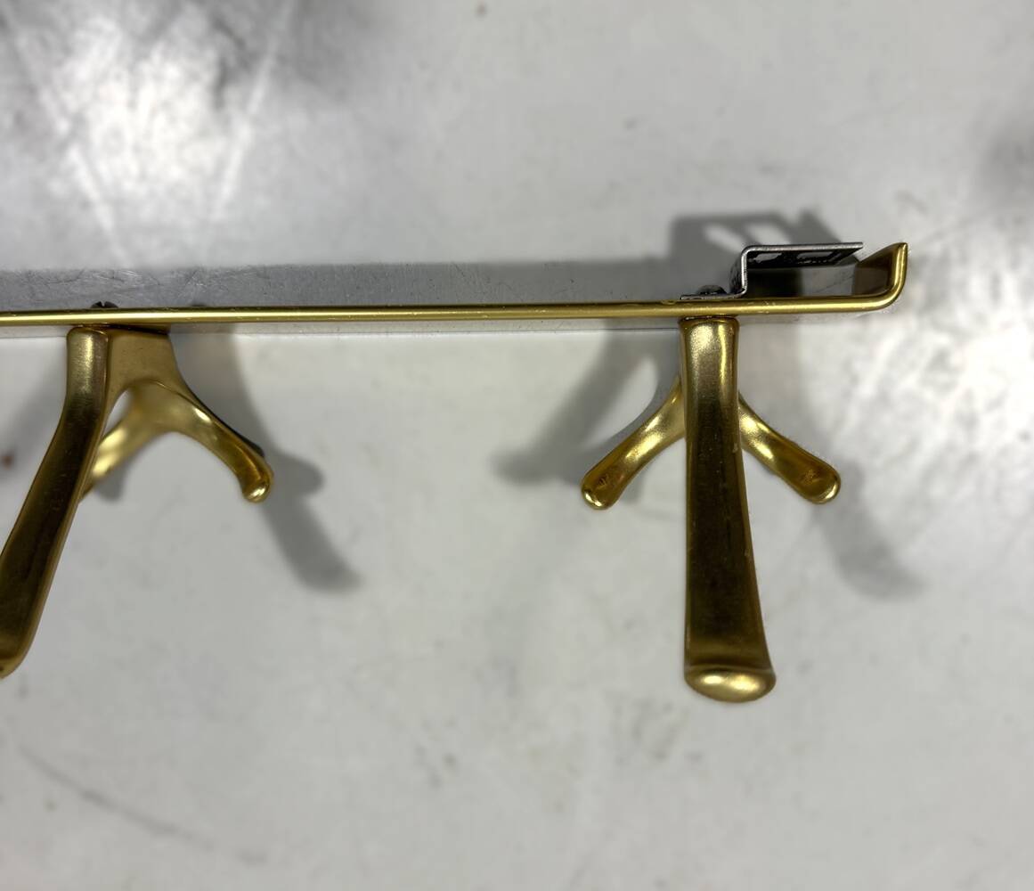 Gold coloured aluminium wall coat racks 1960’s