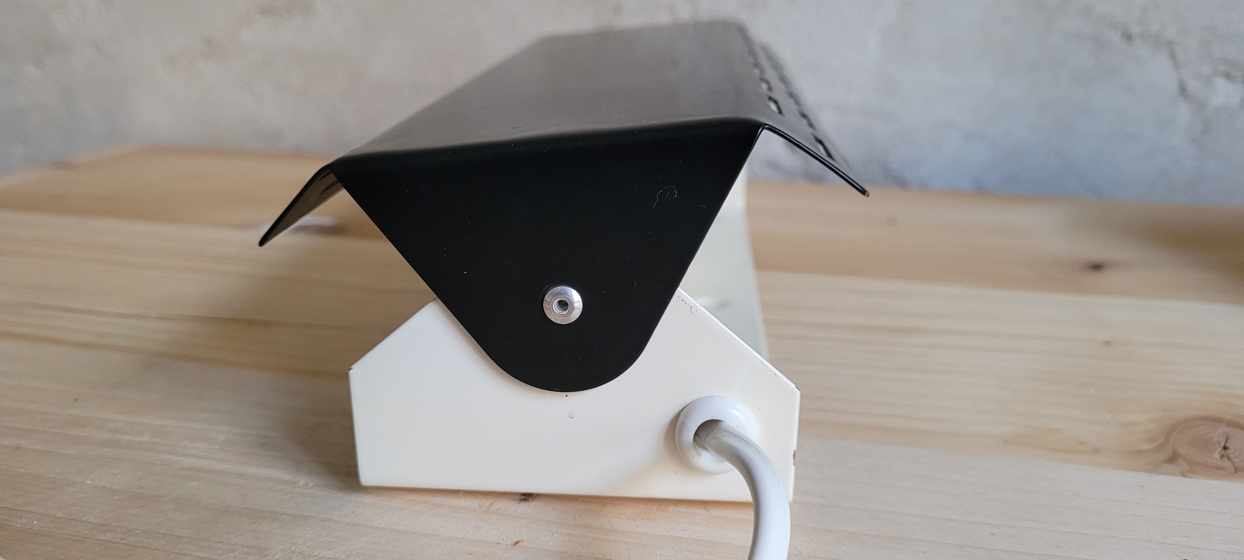 Pair of wall sconces with adjustable shutter