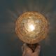 Older wall lamp in metal, brass and “cracked” glass.