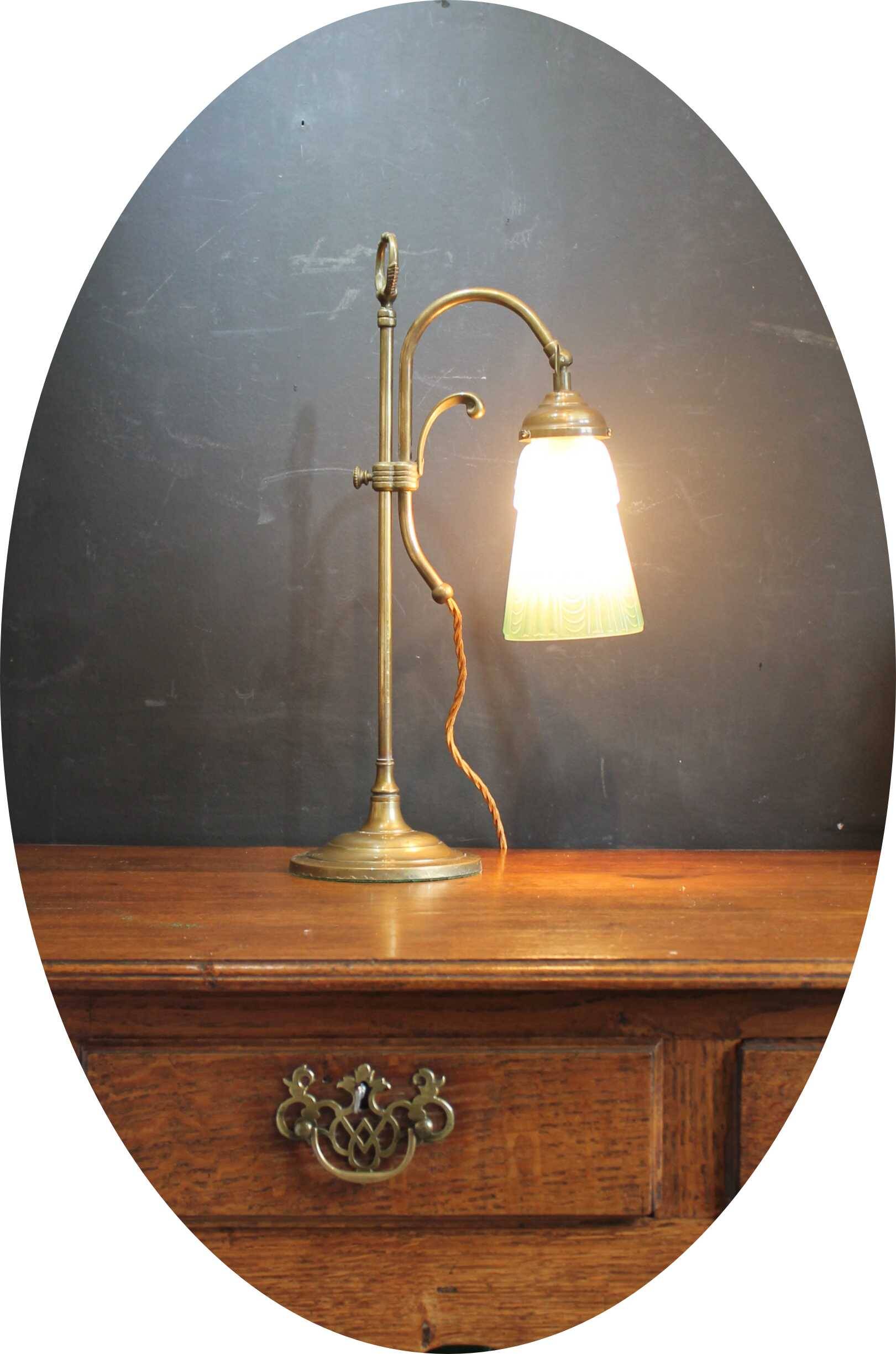 Art Nouveau style brass "rise and fall" table lamps after WAS Benson