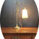 Art Nouveau style brass "rise and fall" table lamps after WAS Benson