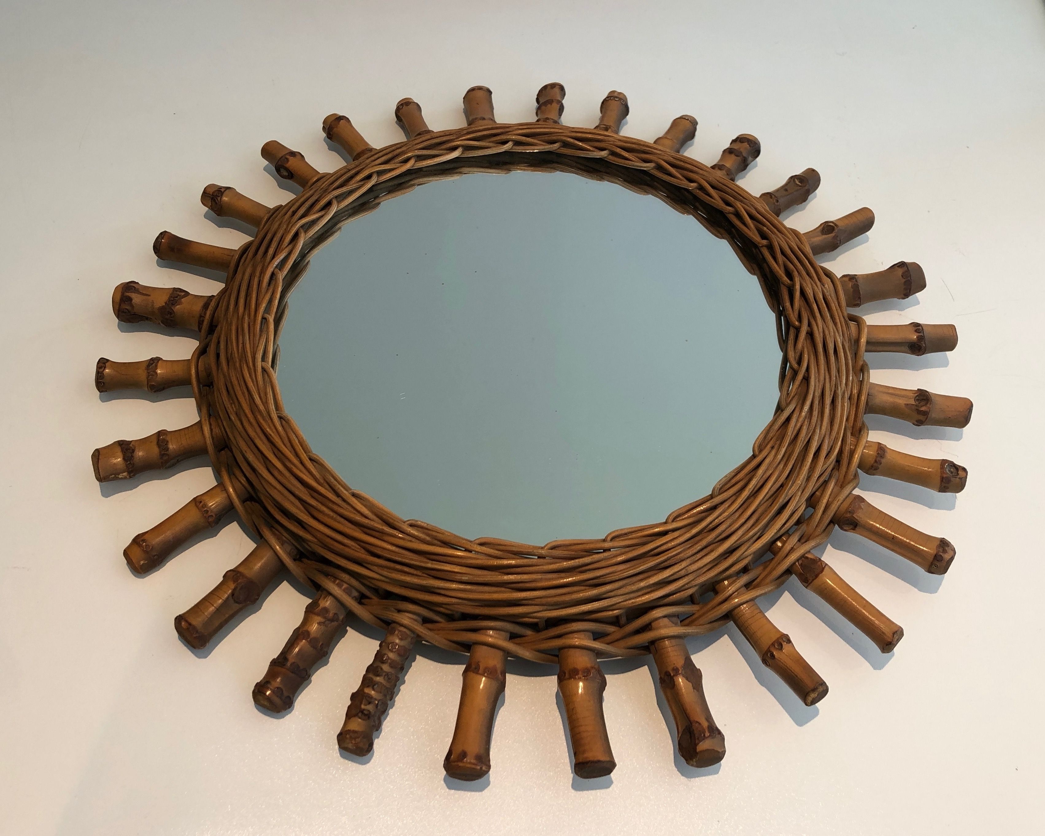 Round rattan mirror