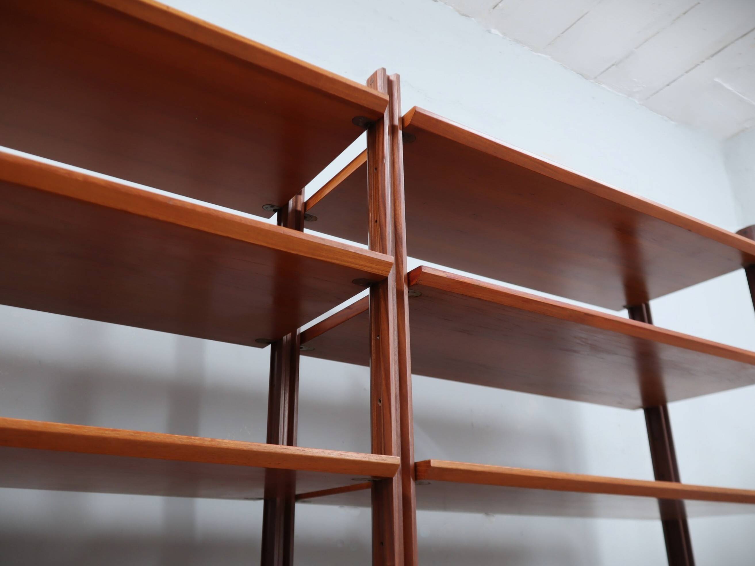 Mid-century modular teak bookcase with drawers and shelves Italy 1960s