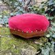 Red velvet footstool in the Louis XV style
