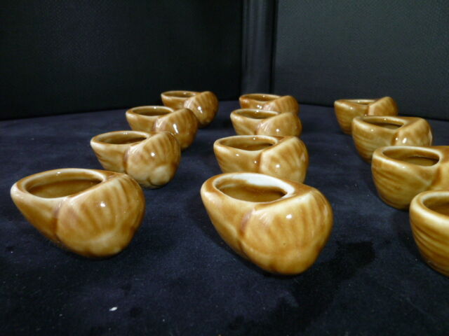 Set of 12 ceramic snail shells