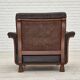 Fauteuil scandinave années 1970, cuir d'ameublement marron, pieds en bois de teck.