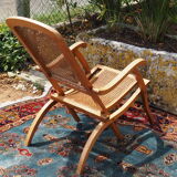 Cane folding armchair in solid wood