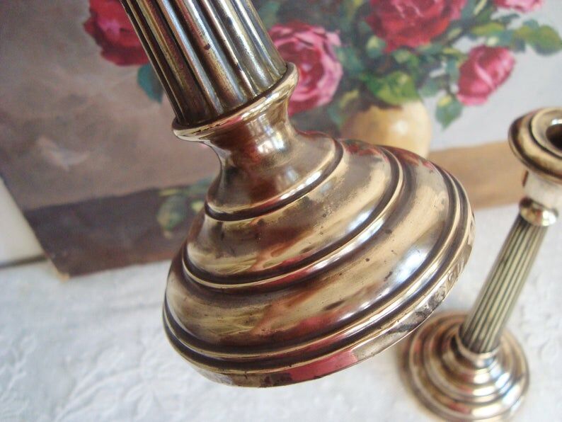 Pair of very old brass candlesticks