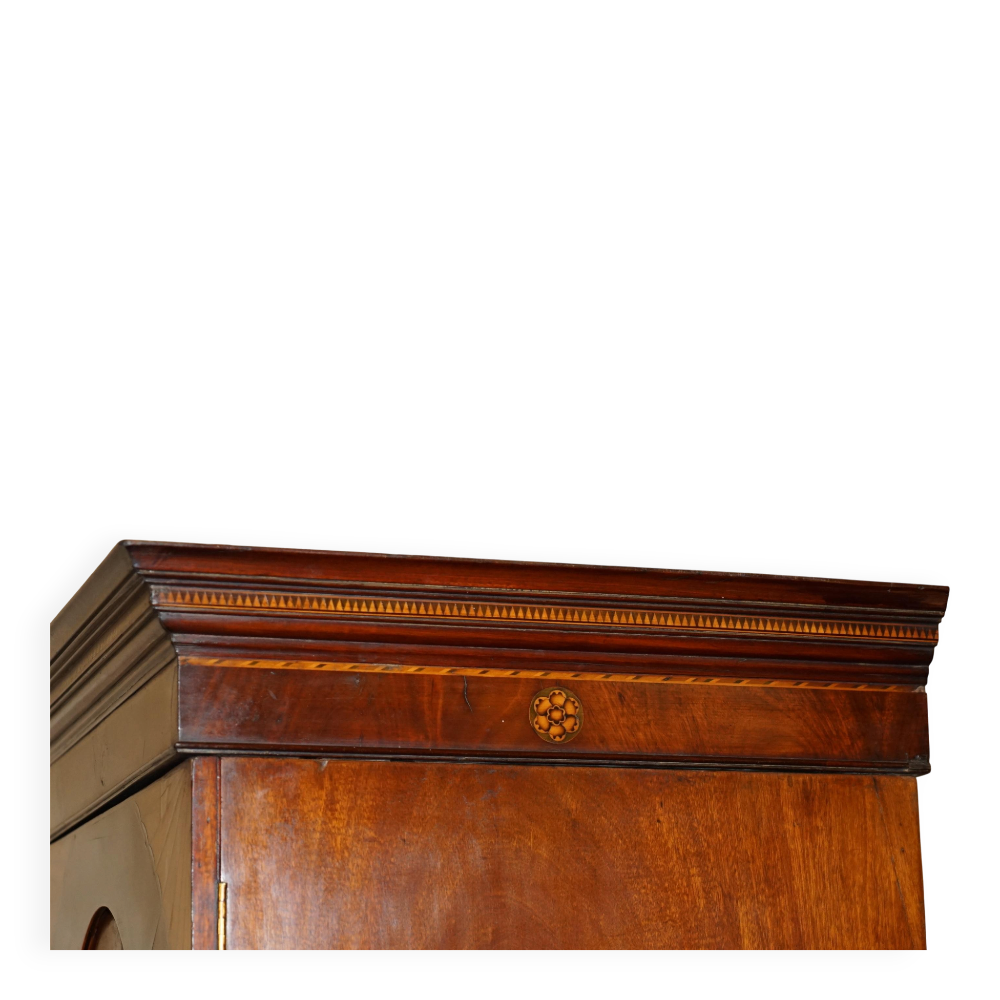 George III Sheraton linen cupboard in walnut, circa 1760.