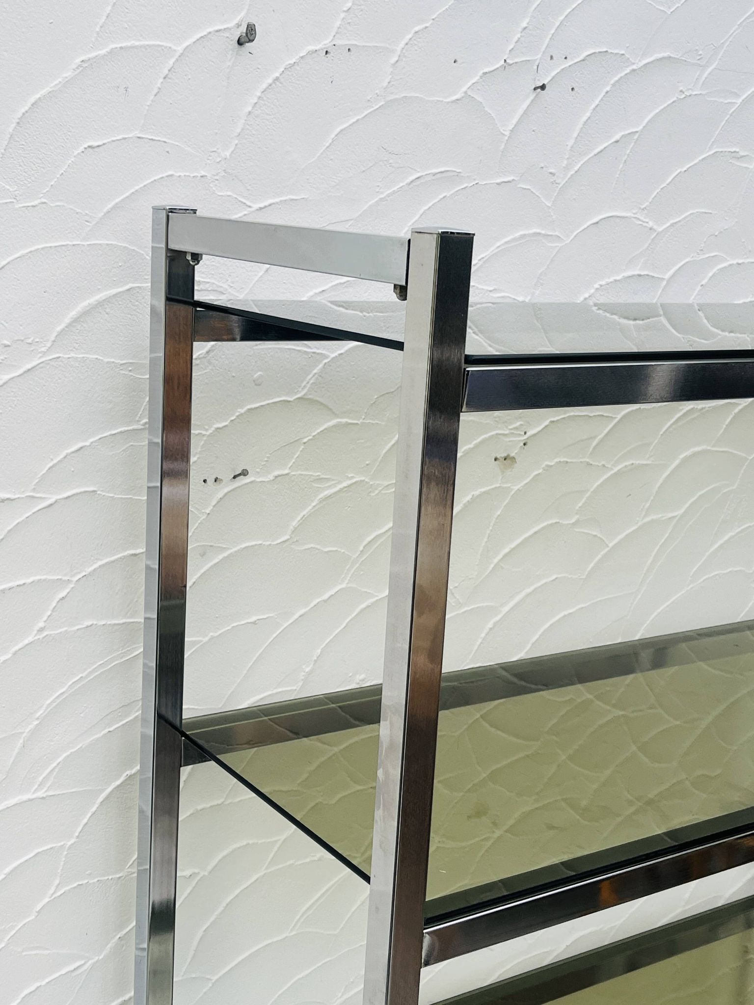 Vintage Italian design shelf in chrome and smoked glass from the 1970s.
