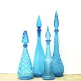 Set of four Italian blue glass carafes, 1960s