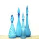 Set of four Italian blue glass carafes, 1960s