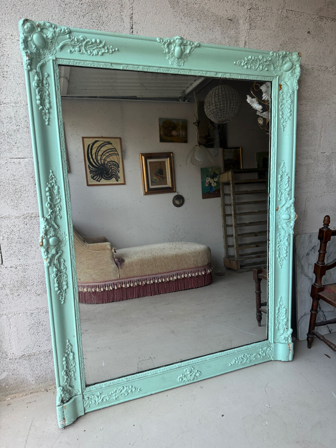Large antique mercury mirror, patinated blue sculpted frame.