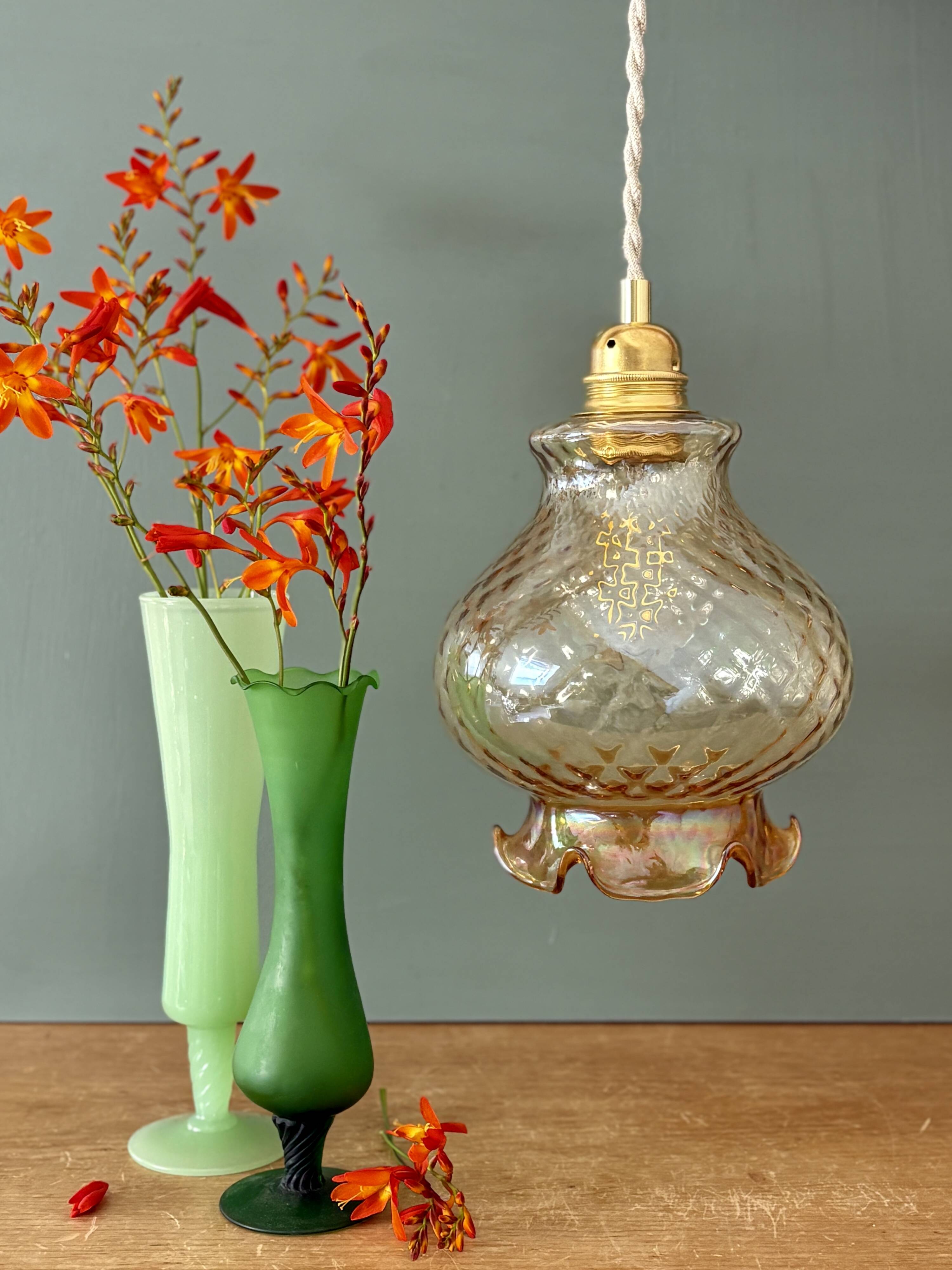 Vintage amber glass suspension globe