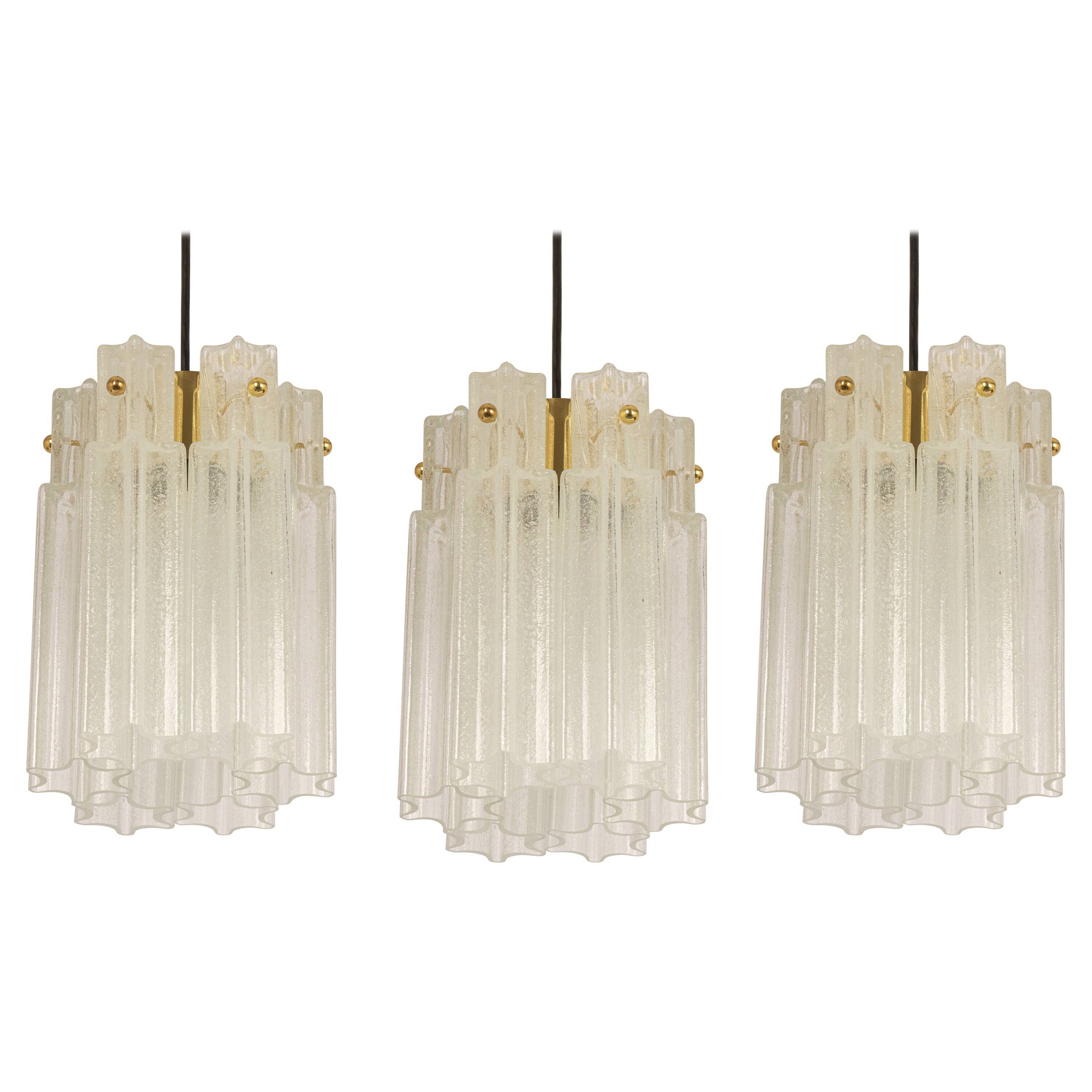 Pendant light with hand-blown glass pieces on a brass base made by Glashütte Limburg.