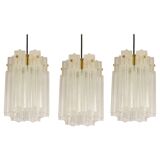 Pendant light with hand-blown glass pieces on a brass base made by Glashütte Limburg.