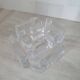 Candle holder or glass warmer with irregular ice effect.