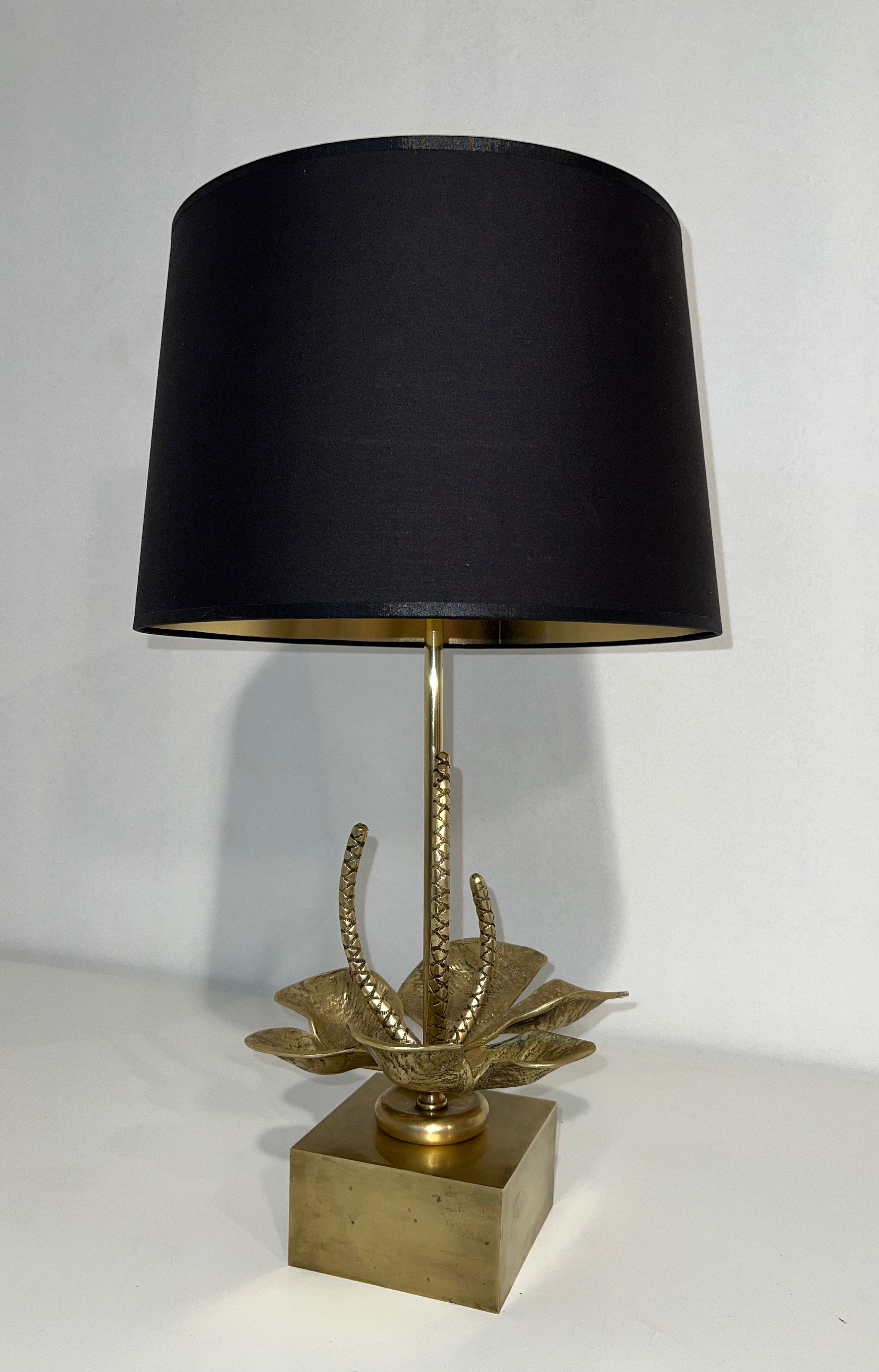 Bronze and brass lily pad lamp attributed to Maison Charles. Circa 1970.