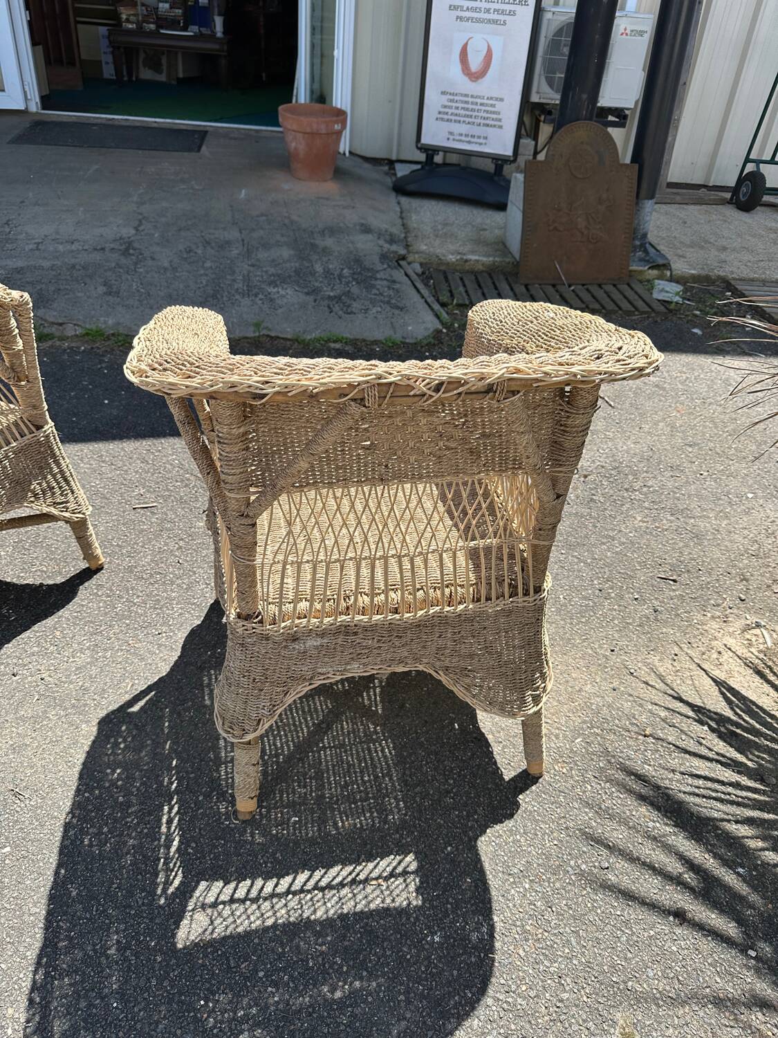 Pair of wicker armchairs