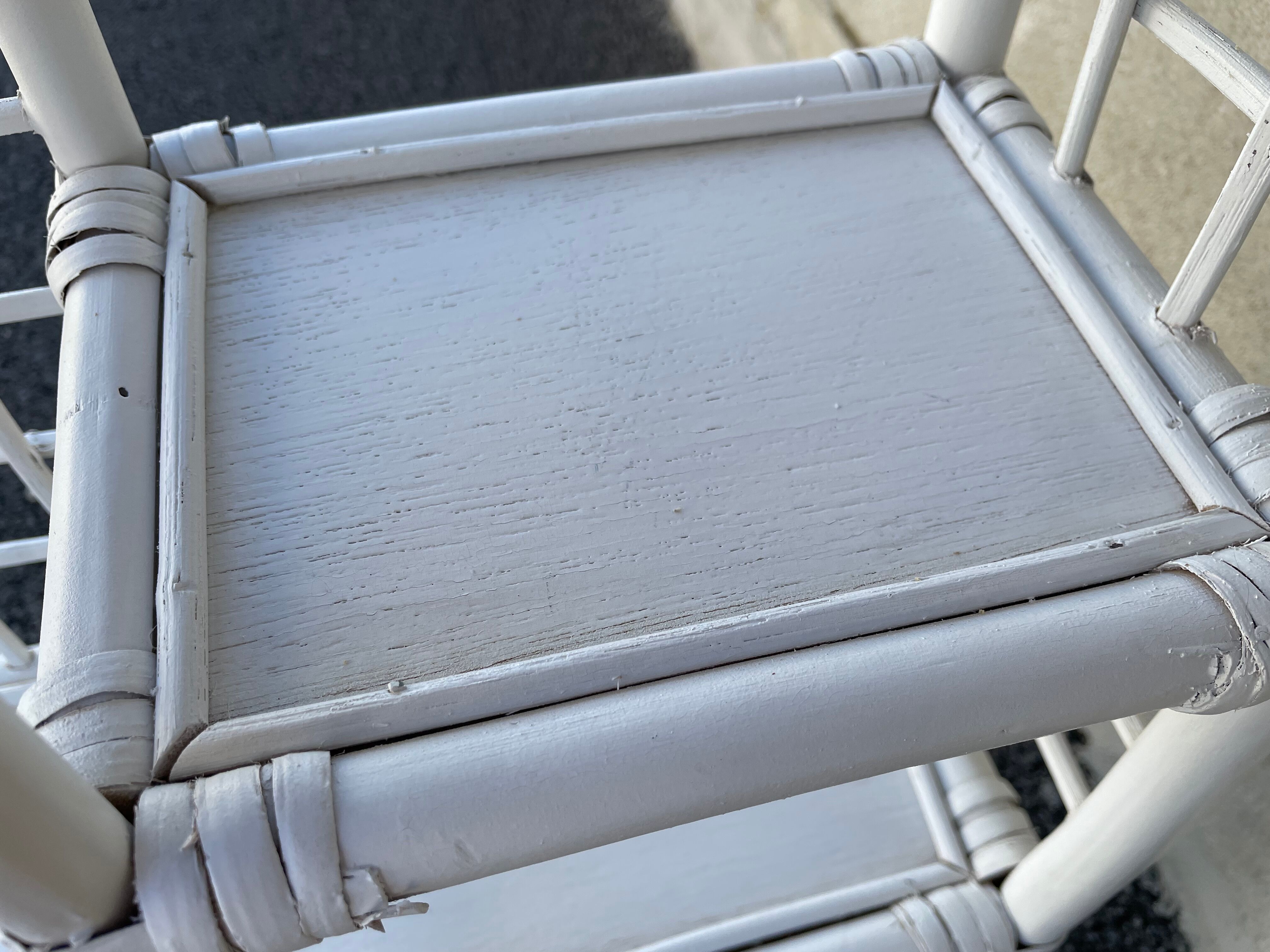 White rattan shelf with braces