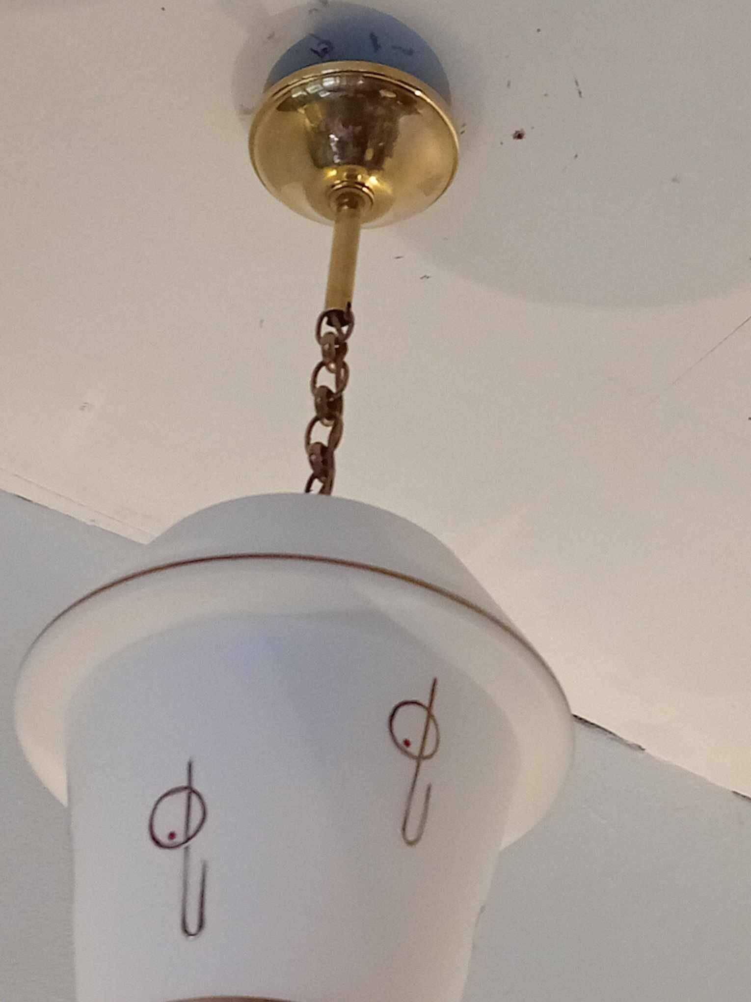 Opaline globe pendant light with stylized 1950s decoration