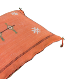 Coussin berbère Sabra orange à pompons