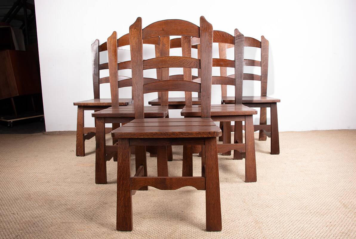 Set of 6 large Brutalist chairs in solid oak from the 1950s.