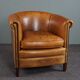 Club armchair in cognac-colored sheepskin