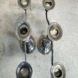 Pair of 2-branch metal candlesticks.