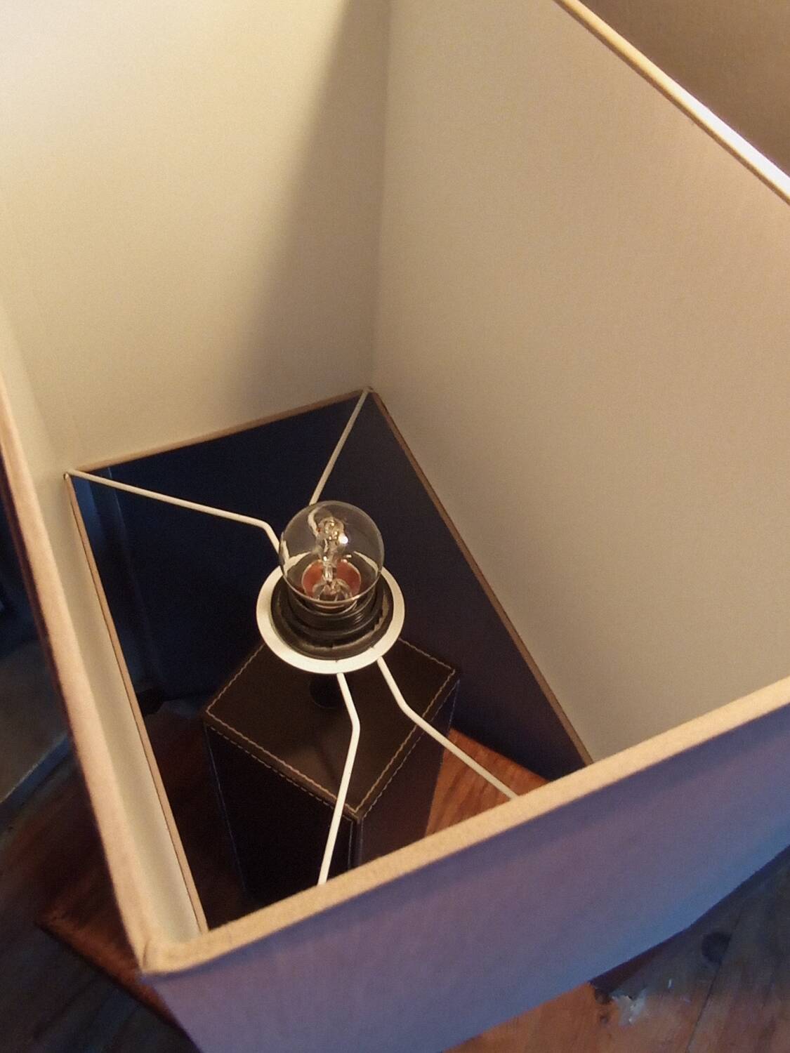 Tall cubic brown leather lamp, light gray fabric lampshade