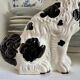 Pair of black Cavalier King Charles dogs in Staffordshire pottery, 19th century.