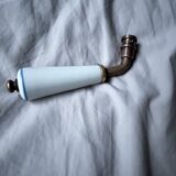 Porcelain and brass door handle