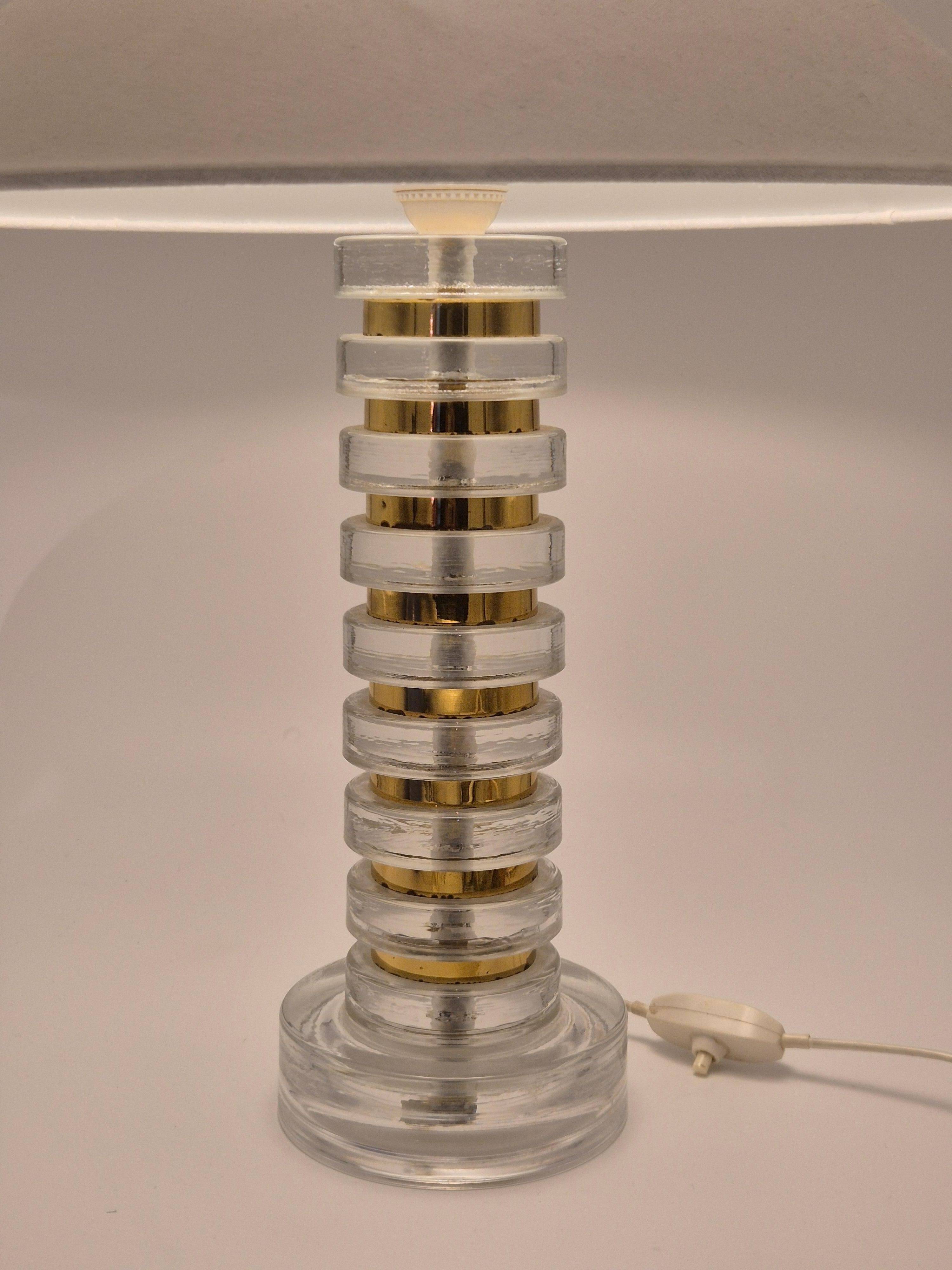 The Modern Scandinavian / Midcentury Modern table lamp with Orrefors glass and brass.