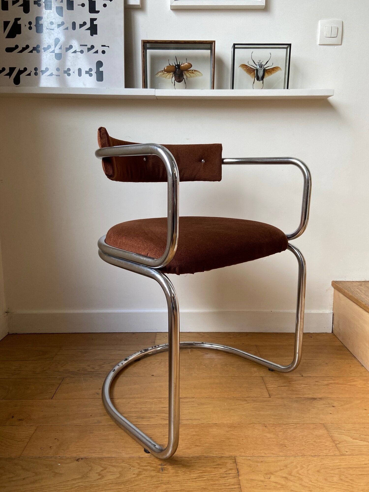 Chrome aluminum chair and brown cotton