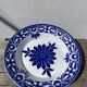 Round hollow ceramic dish with Saint Amand flower