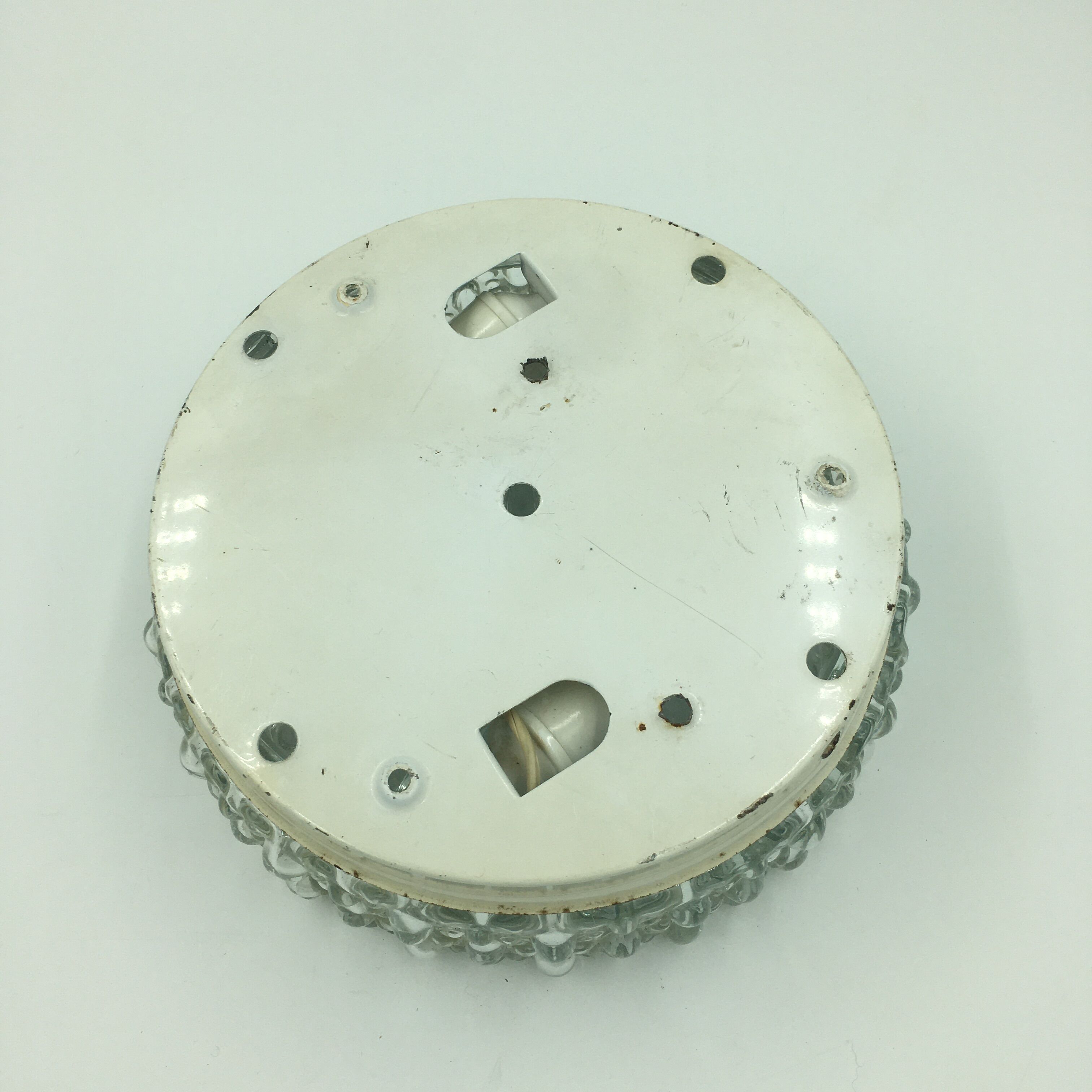 Round ceiling lamp in molded glass with relief
