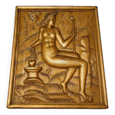 Carved oak panel depicting an allegorical female figure.