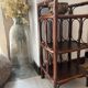 Dark brown 70s bamboo and cane shelf on legs