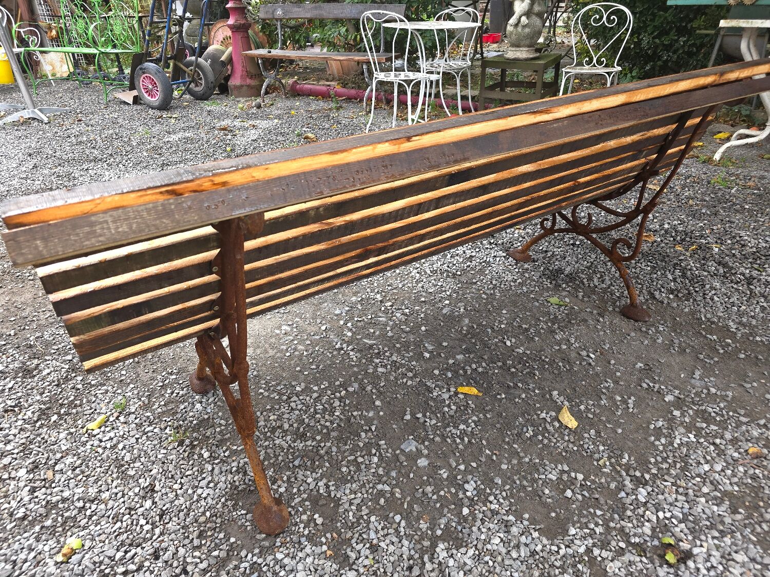 Cast iron garden bench with wooden slats