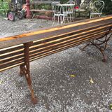 Cast iron garden bench with wooden slats
