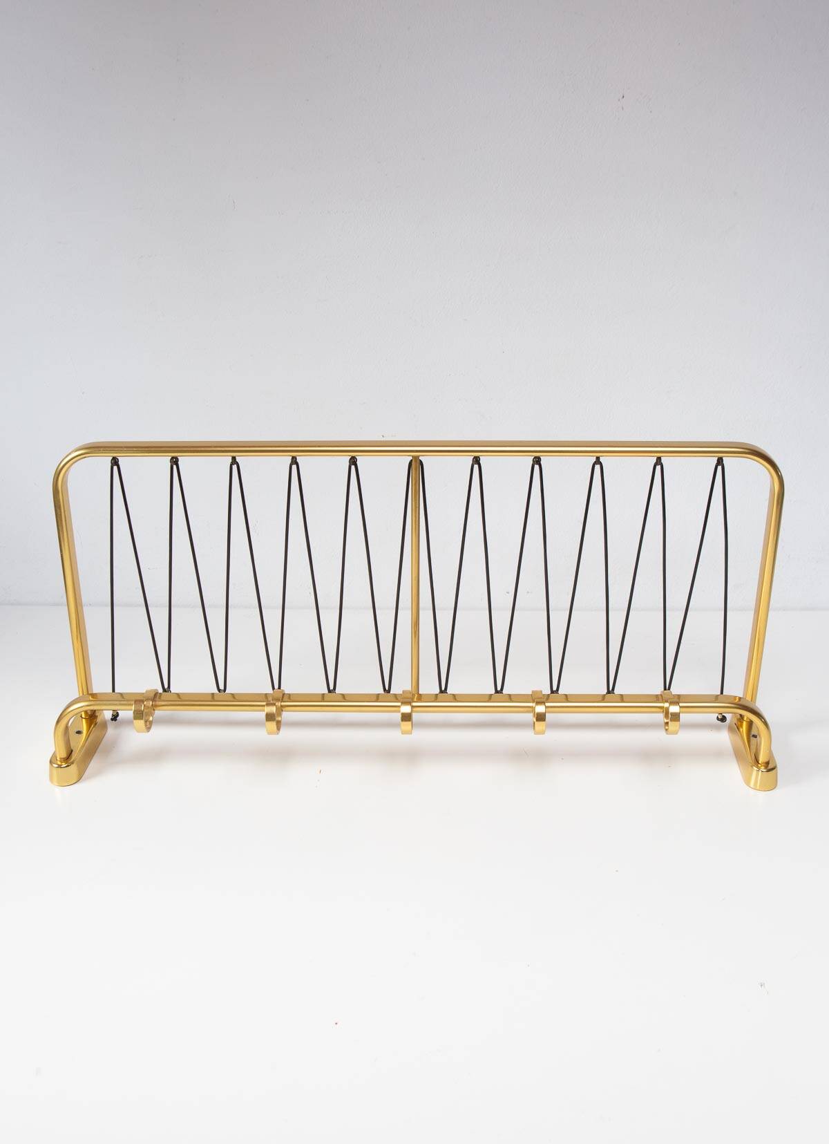 Wall-mounted coat rack with a golden aluminium shelf c. 1960 (62.5 cm)