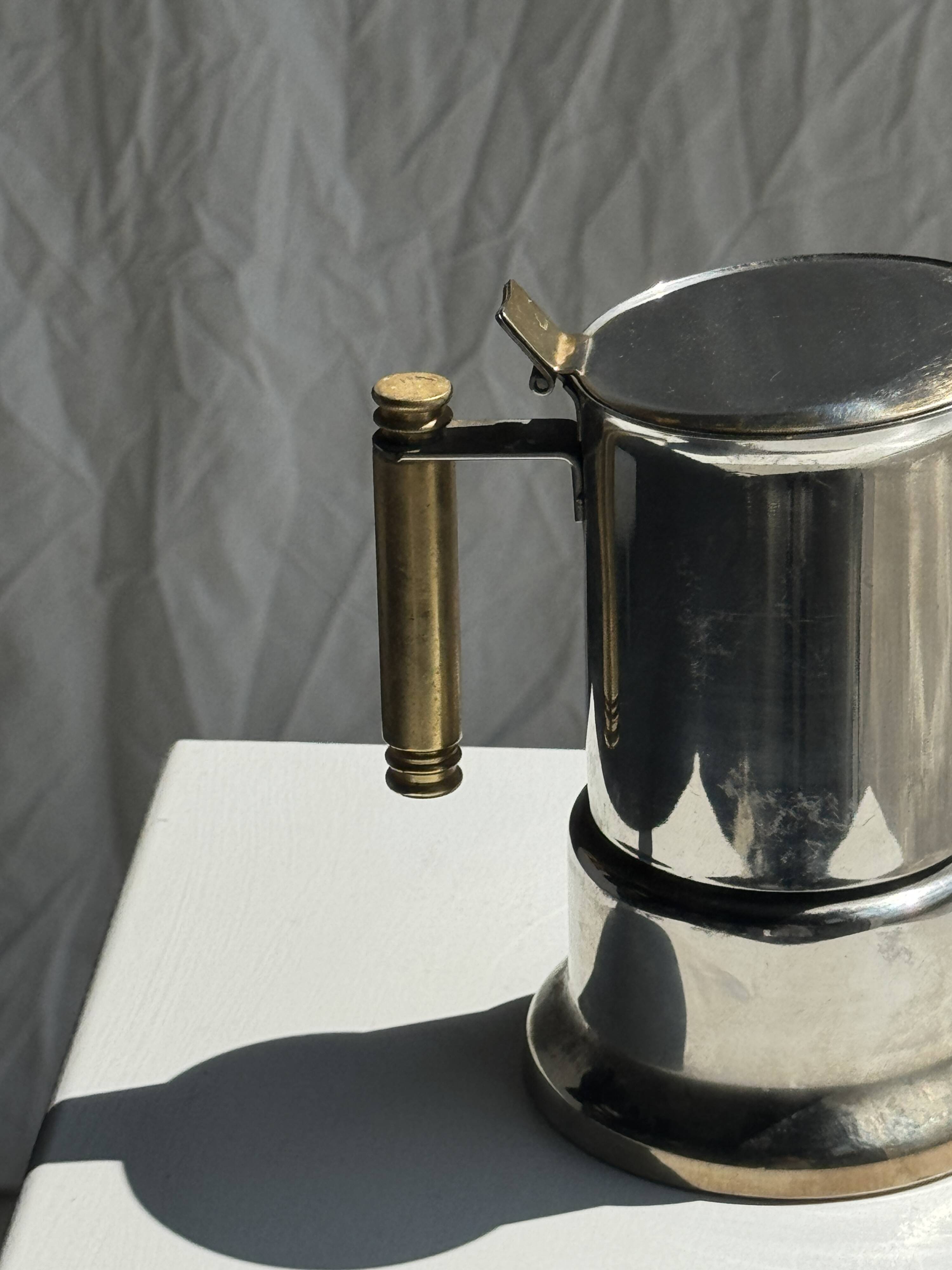 Small silver and gold Italian coffee maker Alpu-F Puppieni in stainless steel