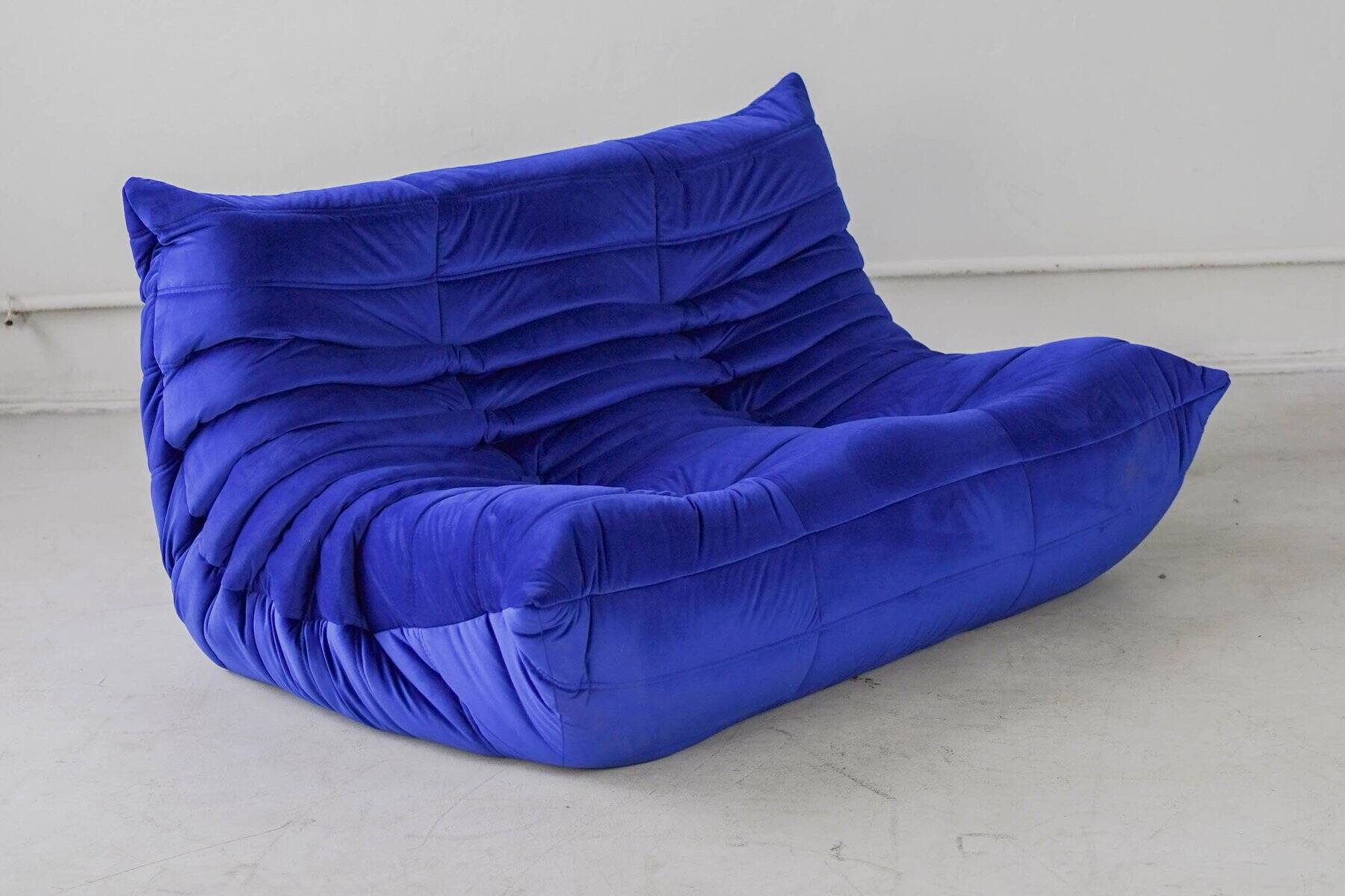 Togo two-seat in blue velvet by Michel Ducaroy for Ligne Roset