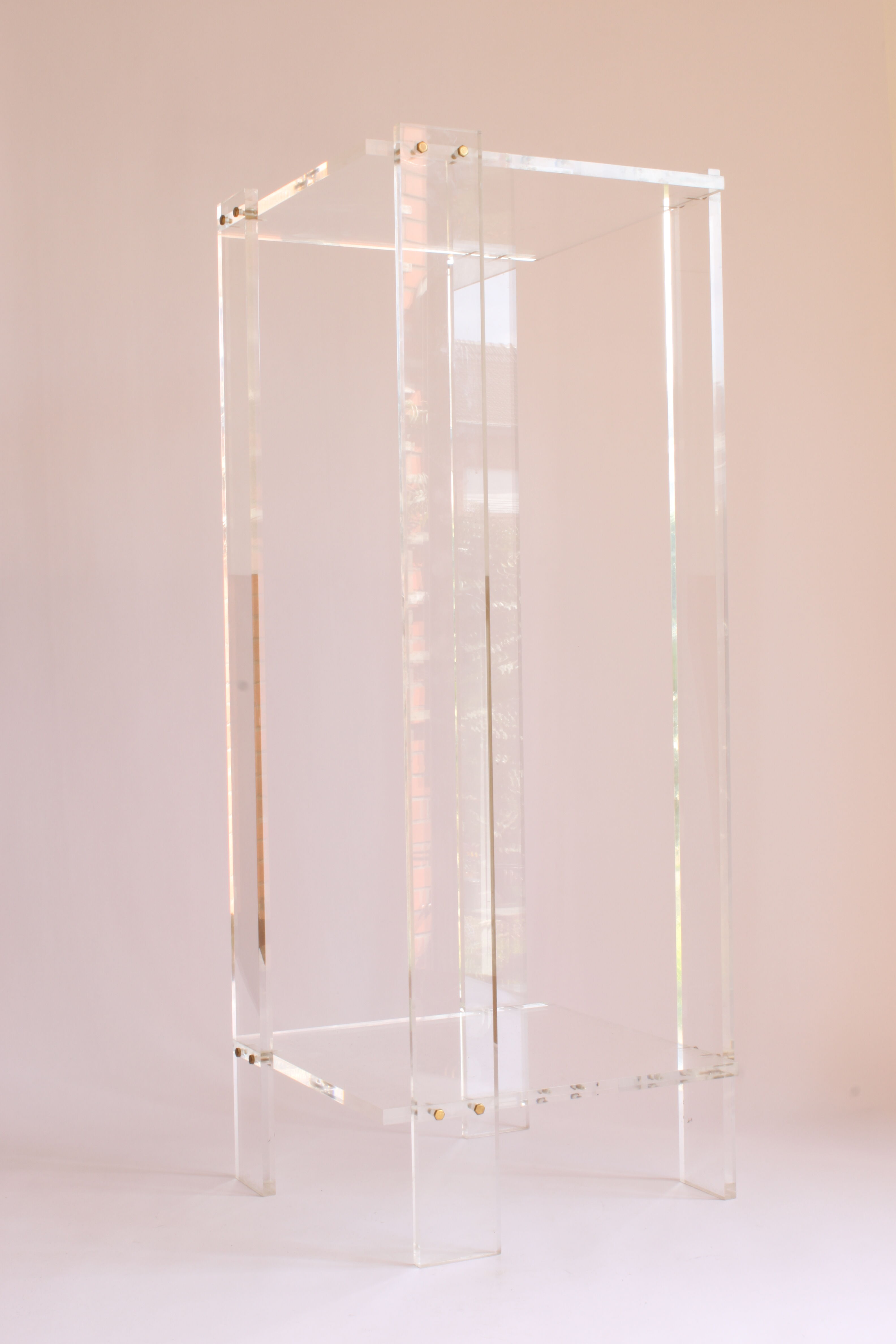 Tall lucite sidetable, 1970s.