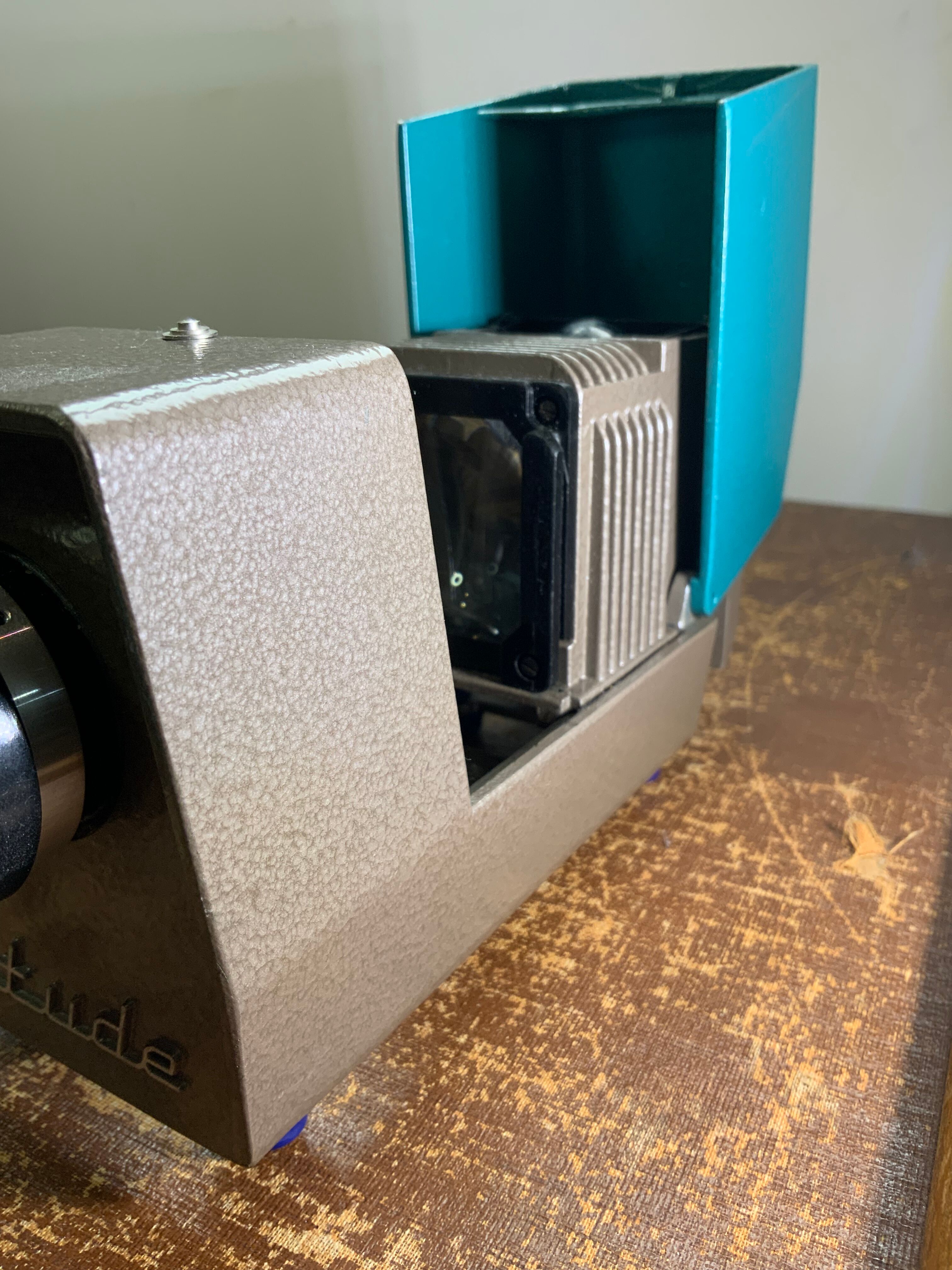 Vintage USSR slide projector in metal enamel blue and gray brand Optical study bulb