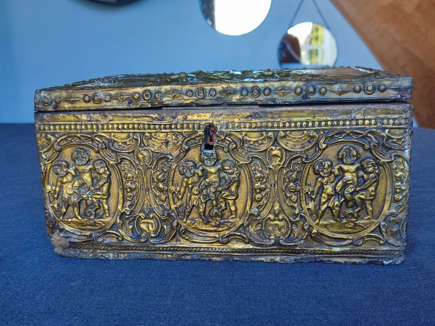 Old wooden box/casket covered with brass