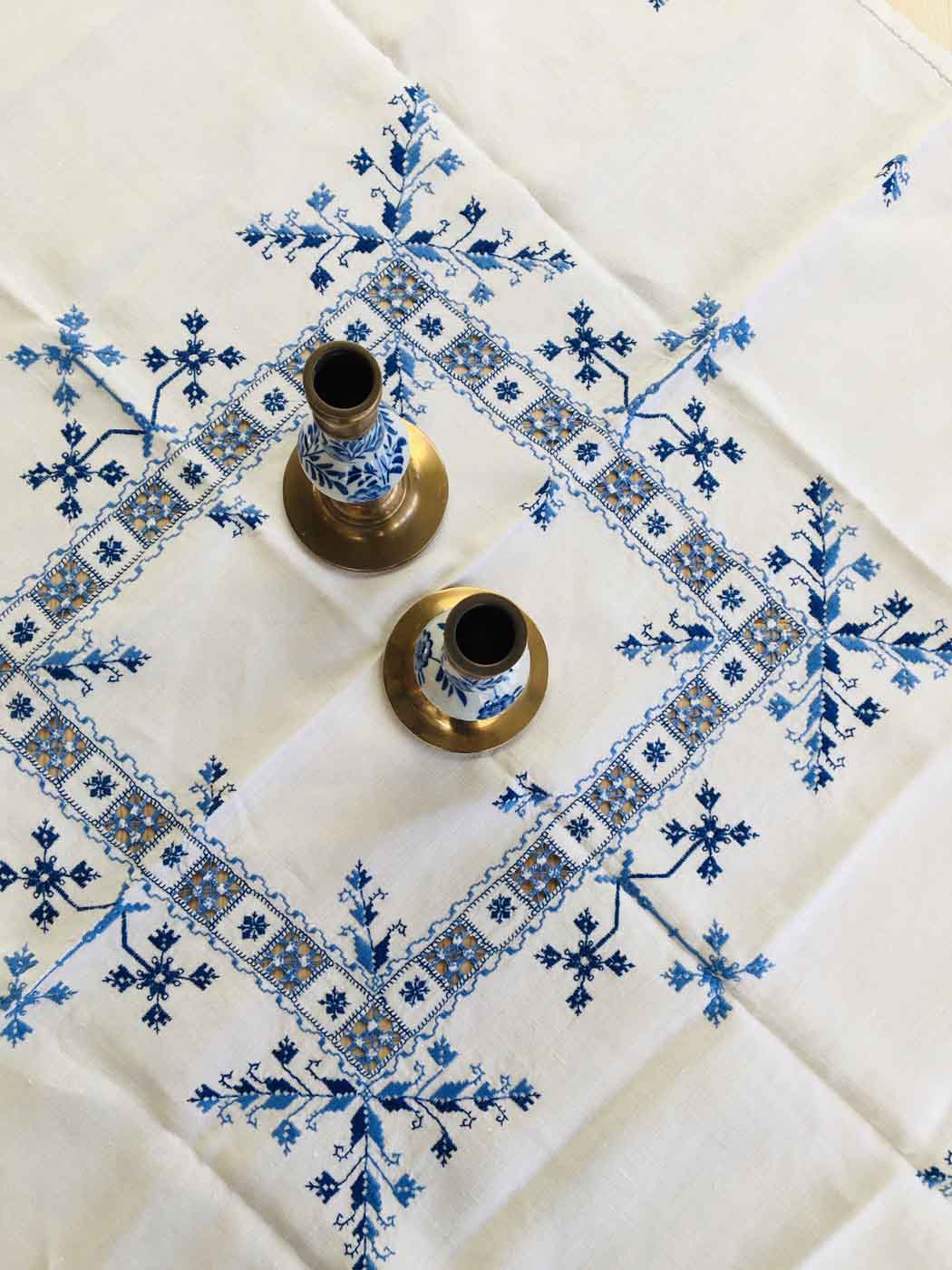 Delft brass and porcelain candlestick duo